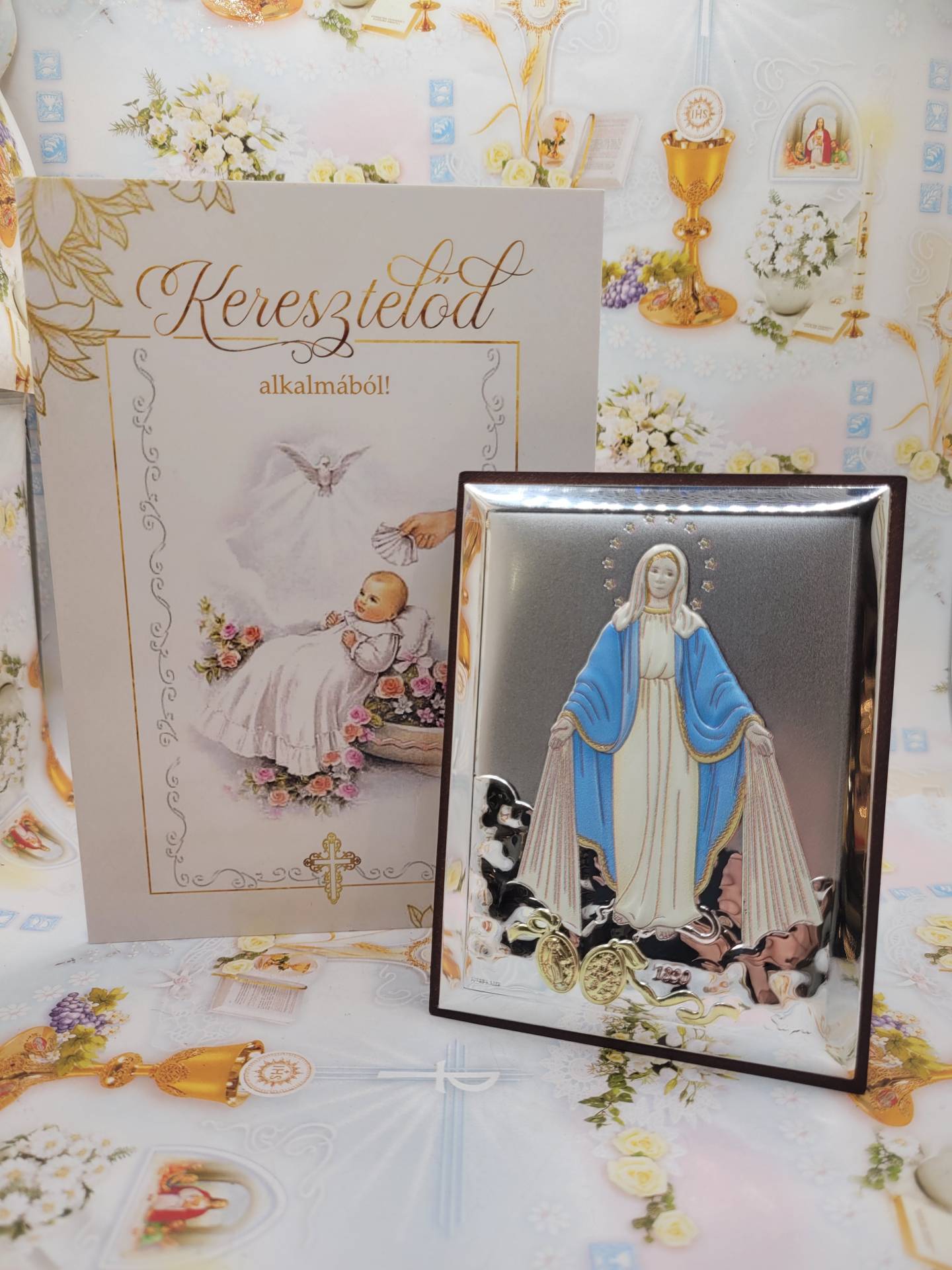 Keresztelőre Kékpalástos segitő szűzanyakép ezüst ikon 8cm*11cm Gratulációs lap áldással tüllbe diszomagoljuk! 